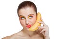 Young woman with banana