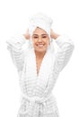 Young woman in a bathrobe and towel on her head Royalty Free Stock Photo