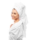 Young woman in a bathrobe and towel on her head Royalty Free Stock Photo