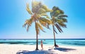 Young woman on beach cheerful joyful coconut palm trees. Beach Caribbean Sea, Cuba Royalty Free Stock Photo