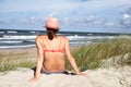 Young woman on beach with hat Royalty Free Stock Photo