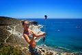 Young woman on the beach in summer using gopro Royalty Free Stock Photo