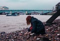 Young woman beachcombing in city Royalty Free Stock Photo