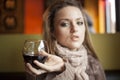 Young Woman with Beautiful Blue Eyes Drinking Red Wine Royalty Free Stock Photo
