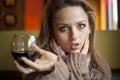 Young Woman with Beautiful Blue Eyes Drinking Red Wine Royalty Free Stock Photo