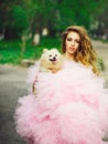 Glamour woman with dog Royalty Free Stock Photo