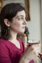 Young Woman with Beautiful Green Eyes Drinking Wine Royalty Free Stock Photo