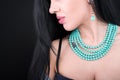 Young woman with beautiful jewelry on black background Royalty Free Stock Photo
