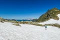 Schladming - A girl hiking through a snowy plateau Royalty Free Stock Photo