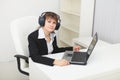 Young woman with big stereos ear-phones on head Royalty Free Stock Photo