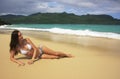 Young woman in bikini laying at Rincon beach, Samana peninsula Royalty Free Stock Photo