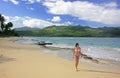 Young woman in bikini walking at Rincon beach, Samana peninsula Royalty Free Stock Photo