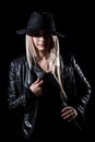 Woman in a black leather jacket Royalty Free Stock Photo