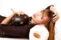 Young woman with black pumking Royalty Free Stock Photo