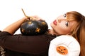 Young woman with black pumking Royalty Free Stock Photo