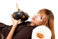 Young woman with black pumking Royalty Free Stock Photo