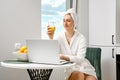 Young woman blogging about healthy eating
