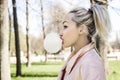 Young woman blowing bubble with chewing gum Royalty Free Stock Photo