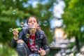 Young Woman Blowing Bubbles Royalty Free Stock Photo