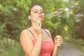 Young Woman Blowing Bubbles Royalty Free Stock Photo