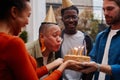 Young Woman Blowing Candles Royalty Free Stock Photo