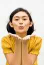 Young woman blowing kiss Royalty Free Stock Photo