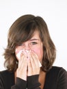 Young Woman Blowing Nose Royalty Free Stock Photo