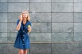 Young woman blowing soap bubbles