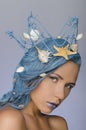 Young woman with blue hair, crown and shells Royalty Free Stock Photo