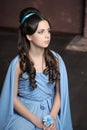 Young girl in blue vintage dress late 19th century Royalty Free Stock Photo