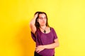 Young woman with blunder expression, isolated on background