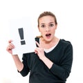 Young woman with board exclamation point Royalty Free Stock Photo