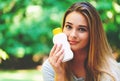 Young woman a bottle of sunblock outside Royalty Free Stock Photo