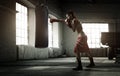 Young woman boxing workout in an old building Royalty Free Stock Photo