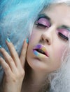 Young woman with bright make up and creative hair Royalty Free Stock Photo