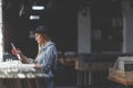 Young woman browsing vinyl records indoors Royalty Free Stock Photo