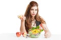 Young woman brunette present and eating salad Royalty Free Stock Photo