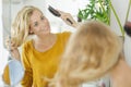 young woman brushing hair Royalty Free Stock Photo