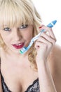 Young Woman Brushing Teeth Holding Tooth Brush Royalty Free Stock Photo