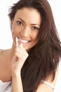 Young Woman Brushing Teeth In Studio