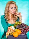 Young woman with a bunch of food Royalty Free Stock Photo