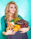 Young woman with a bunch of food Royalty Free Stock Photo