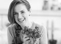 Young woman with bunch of radishes Royalty Free Stock Photo