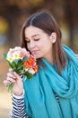 Young woman with bunch of wildflowers Royalty Free Stock Photo