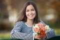 Young woman with bunch of wildflowers Royalty Free Stock Photo