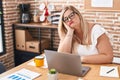 Young woman business worker boring using laptop working at office Royalty Free Stock Photo