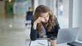 Young woman business worker tired working at the office Royalty Free Stock Photo