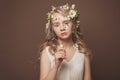 Young woman with butterflies in her hair and nude eye makeup, art portrait Royalty Free Stock Photo