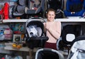 woman buyer with infant& x27;s car cradle Royalty Free Stock Photo