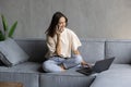 Happy young woman caller talking on the phone at home Royalty Free Stock Photo